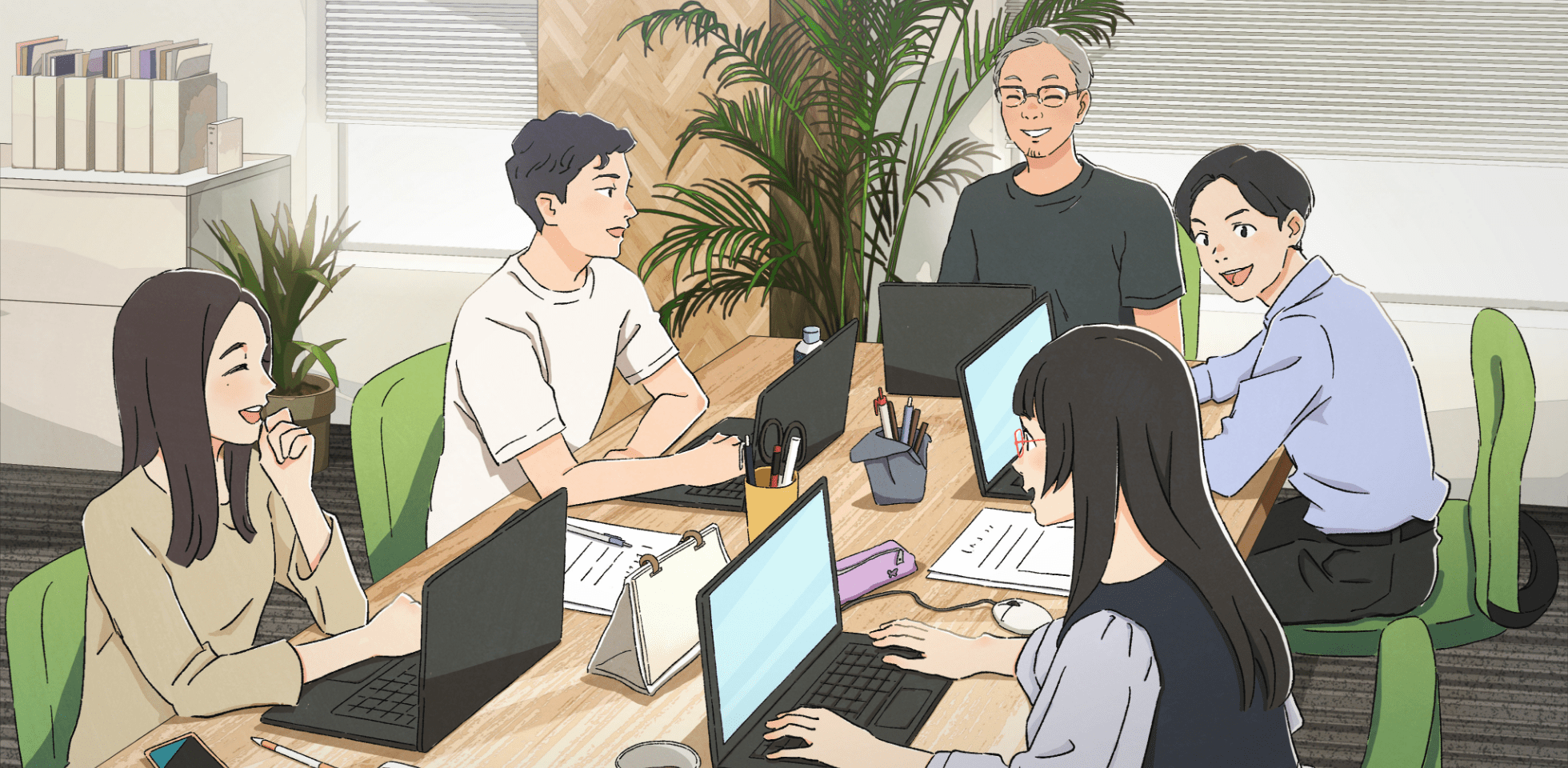 スタッフがミーティングしている様子